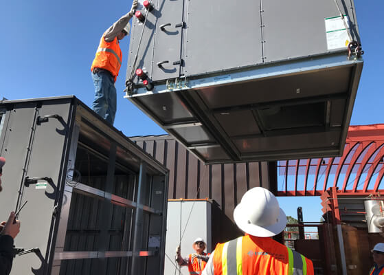 EMCOR Services NY/NJ crew installing a new energy-efficient HVAC system